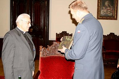 Cardinal Miloslav Vlk received a bible from the chief of the army staff Vlastimil Picek