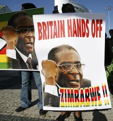 Protestors demonstrate outside of an EU Africa summit in Lisbon last Saturday Protestors demonstrate outside of an EU Africa summit in Lisbon last Saturday