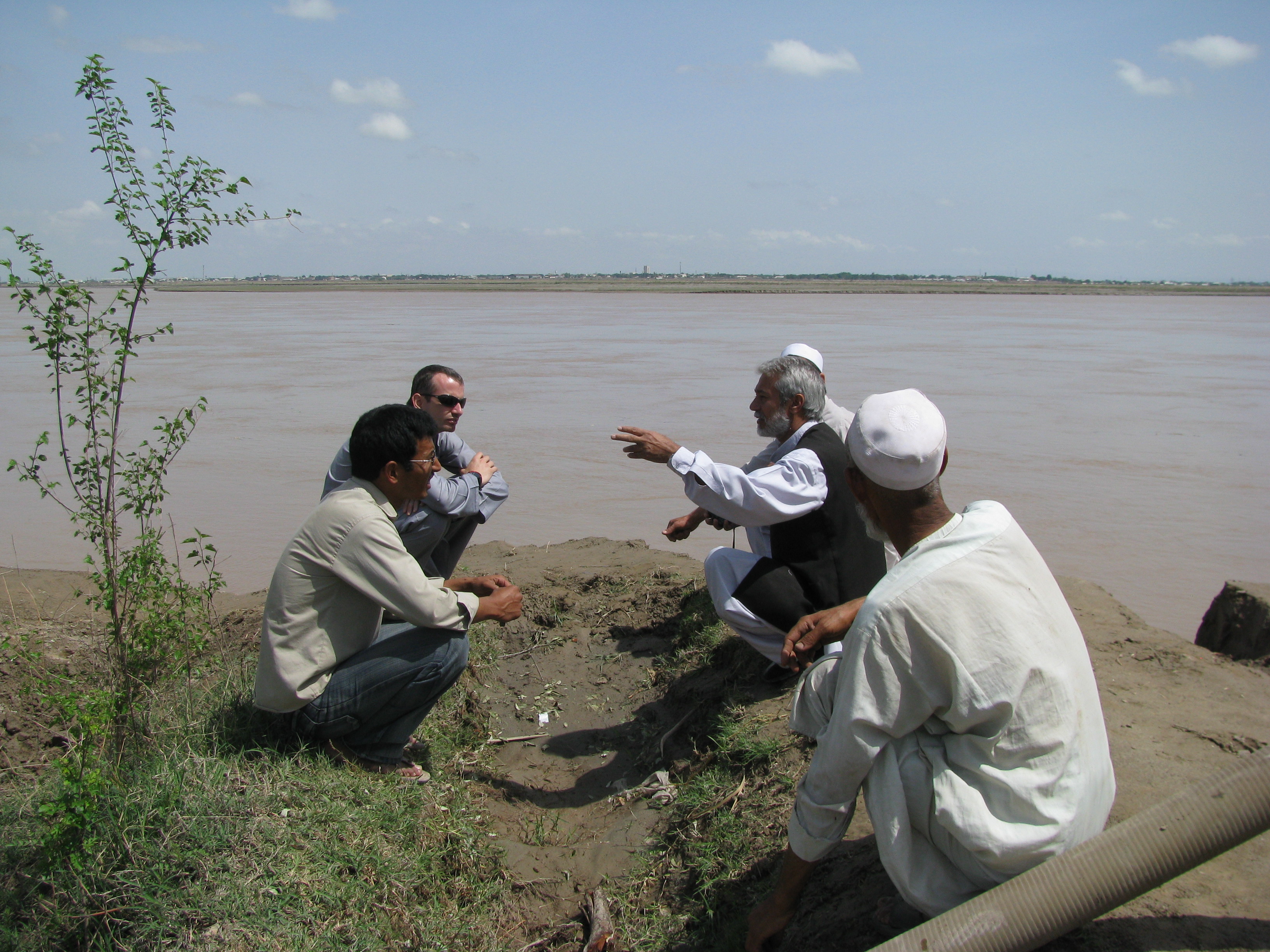 The Amu Darya river has divided the land in the background from the farm in the foreground in slightly over one year