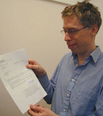  David Vaughan with a letter confirming that he has been added to the electoral roll