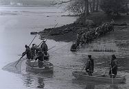 Fishermen fishing out Talinsky Pond