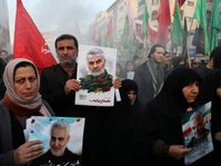 Mourners holding posters of Iranian Gen. Qassem Soleimani attend a funeral ceremony for him and his comrades, Tehran, Iran, January 6, 2020, photo: ČTK/AP/Ebrahim Noroozi