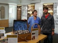 Vera Egermayer thanks Ariel, an Israeli backpacker, for his founding contribution to the Memorial, photo: NZ Children's Holocaust Memorial website