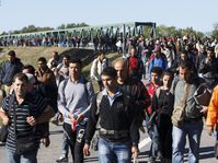 Migrants walk towards Hungary across a bridge over River Drava in Croatia, September 21, 2015, photo: CTK