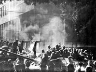 Tanks burning outside the Czechoslovak Radio building, August 1968