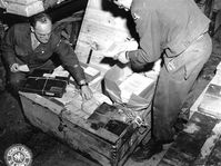 The boxes of hidden documents were opened back at the G-2 warehouse in Frankfurt, Germany. (111-SC-229100), photo: US National Archives