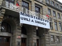 Greenpeace activists climbed on to a balcony at the Ministry of Industry and Trade and unfurled a banner declaring it the 'Ministry of Coal and Smog', photo: CTK